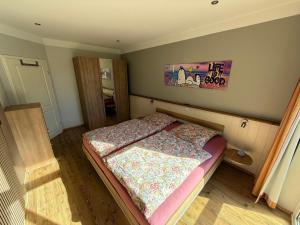 Postel nebo postele na pokoji v ubytování Ferienhaus-Maxe-Wohnung-Hannah