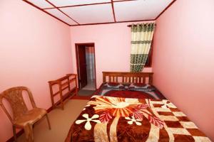 Postel nebo postele na pokoji v ubytování Holiday Guest in Nuwara Eliya