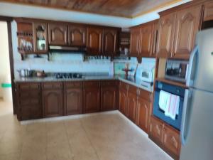 Nhà bếp/bếp nhỏ tại Hermosa parcela y buena vista +34 ảnh