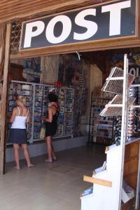 two women standing in front of a pos store at Neptune Hotel in Dahab
