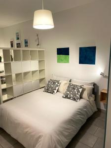 Ένα ή περισσότερα κρεβάτια σε δωμάτιο στο Casina Baglio +27 φωτογραφίες