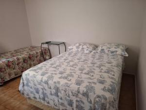 Postel nebo postele na pokoji v ubytování Hospedagem Franzoi