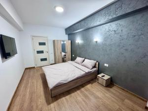 Postel nebo postele na pokoji v ubytování Apartament