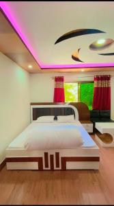 Postel nebo postele na pokoji v ubytování Moonlight guesthouse gamba skardu