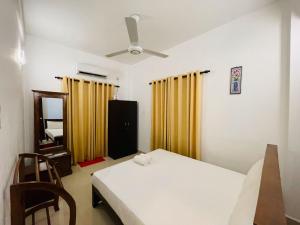 Ένα ή περισσότερα κρεβάτια σε δωμάτιο στο AEONSKY 7 - Liyasha Villa +52 φωτογραφίες