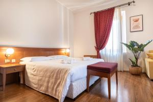 Postel nebo postele na pokoji v ubytování Sottoassisi - Guest House