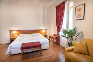 Postel nebo postele na pokoji v ubytování Sottoassisi - Guest House
