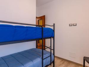 Postel nebo postele na pokoji v ubytování Apartment Vignola by Interhome