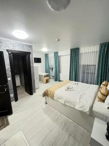 Ліжко або ліжка в номері Grey Boutique Hotel Palas