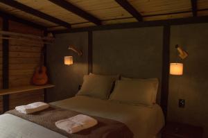 Una cama o camas en una habitación de Sítio Porteira Sete, Cabana no Vale