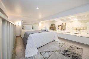 Postel nebo postele na pokoji v ubytování Dina Beach House