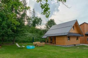 Vonkajšia záhrada v ubytovaní Domek Pod Laskiem