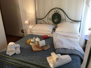 Postel nebo postele na pokoji v ubytování Villa Loghino