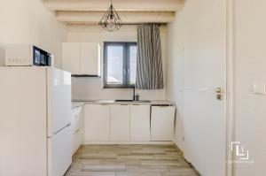 Dapur atau dapur kecil di Domki Sul Mare