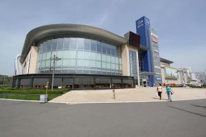 a large building with people walking in front of it at New Belgrade Apartments, parking 5 eur per day in Belgrade