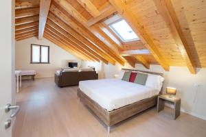 Cama ou camas em um quarto em Il Grifo