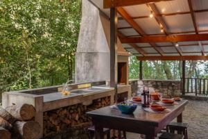 Μπαλκόνι ή βεράντα στο A refuge in nature - Chalet D'Avó Teresa +30 φωτογραφίες