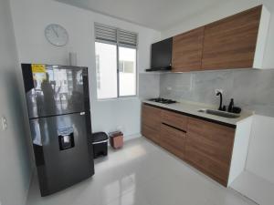Η κουζίνα ή μικρή κουζίνα στο Apartamento ideal para descansar en Girardot