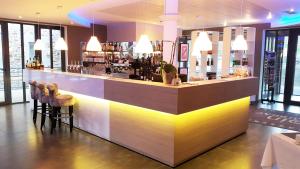 Nápoje v ubytování Coin d'Aubrac Hôtel Restaurant SPA de luxe