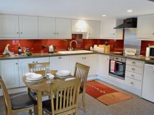 Kuchyň nebo kuchyňský kout v ubytování Chywood Barn