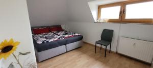 En eller flere senge i et værelse på Ferienwohnung Mila
