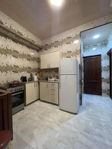 Kuchyň nebo kuchyňský kout v ubytování Kolkha - 1Kolkheti street