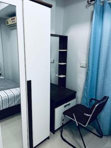 Postel nebo postele na pokoji v ubytování The European House Pattaya + 15 fotografií