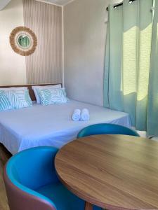 Postel nebo postele na pokoji v ubytování Seaview Terrace appartement No 16