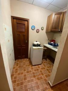 Kuchyň nebo kuchyňský kout v ubytování Hostal Beiro
