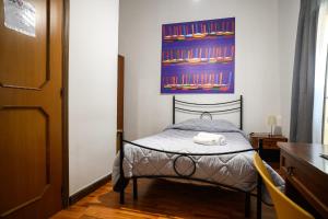Postel nebo postele na pokoji v ubytování B&B Al Centro