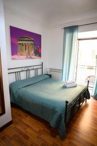 Postel nebo postele na pokoji v ubytování B&B Al Centro