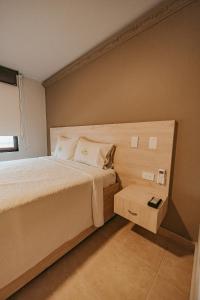 Postel nebo postele na pokoji v ubytování HOTEL VERANO