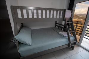 Postel nebo postele na pokoji v ubytování Mavil Apartment