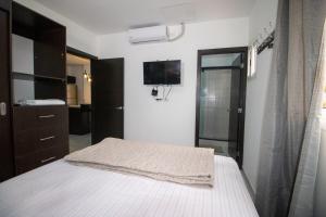 Postel nebo postele na pokoji v ubytování Mavil Apartment