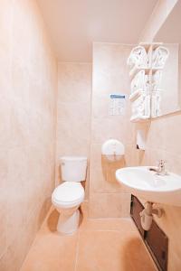 Koupelna v ubytování HOTEL VERANO