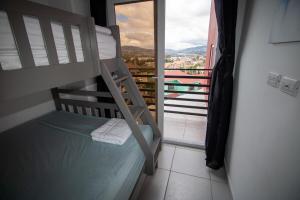 Postel nebo postele na pokoji v ubytování Mavil Apartment