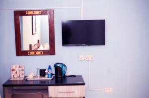 TV a/nebo společenská místnost v ubytování maya bnb