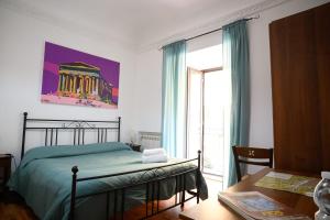 Postel nebo postele na pokoji v ubytování B&B Al Centro