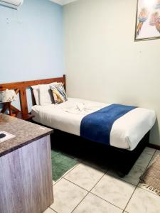 Postel nebo postele na pokoji v ubytování maya bnb