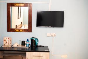 TV a/nebo společenská místnost v ubytování maya bnb