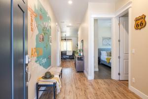 a bedroom with a room with a bed and a hallway at Flagstaff Route 66 Retreat in Flagstaff