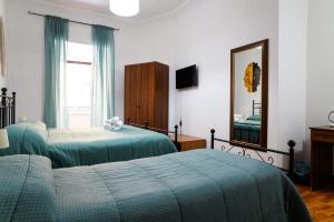 Postel nebo postele na pokoji v ubytování B&B Al Centro