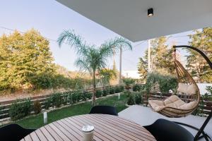 Κήπος έξω από το Kyan Executive Suites +62 φωτογραφίες
