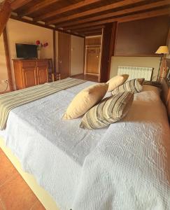 Postel nebo postele na pokoji v ubytování Hotel Guara Inlukā