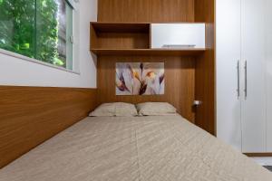 En eller flere senge i et værelse på Localização privilegiada: Orla de Icaraí