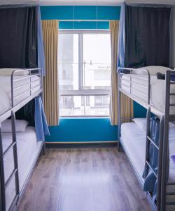 Postel nebo postele na pokoji v ubytování Samesun Hollywood Hotel & Hostel