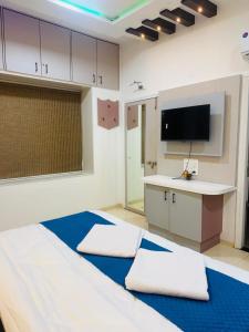 Et tv og/eller underholdning på The Royal Luxor 3Bhk Villa