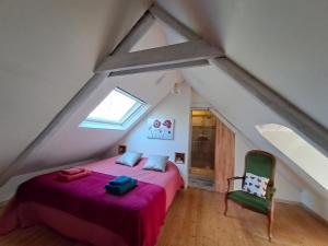 Postel nebo postele na pokoji v ubytování Penty La Houssaye