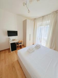 Кровать или кровати в номере Seveso Milan Central Rooms