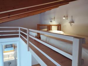 a bedroom with two beds in a room at Endless Summer Surf House in Aljezur